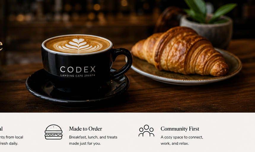 Codex Landing Cafe interior — warm tables, framed art, and natural light